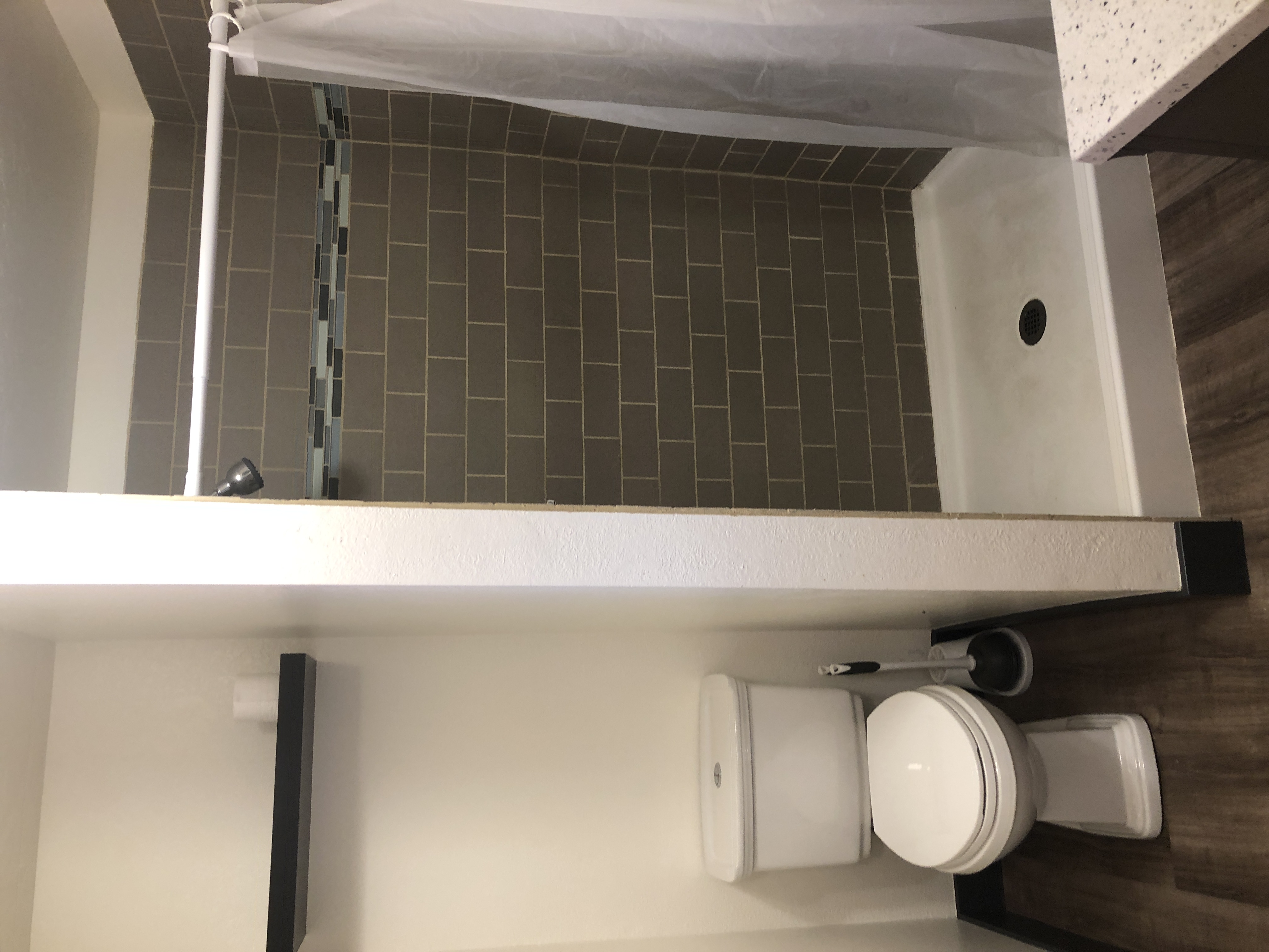 Bathroom remodel with tiled walk-in shower