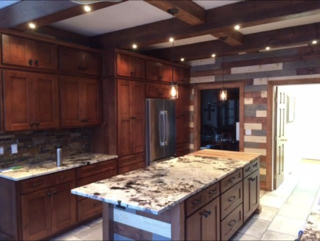 Custom kitchen cabinetry with granite island