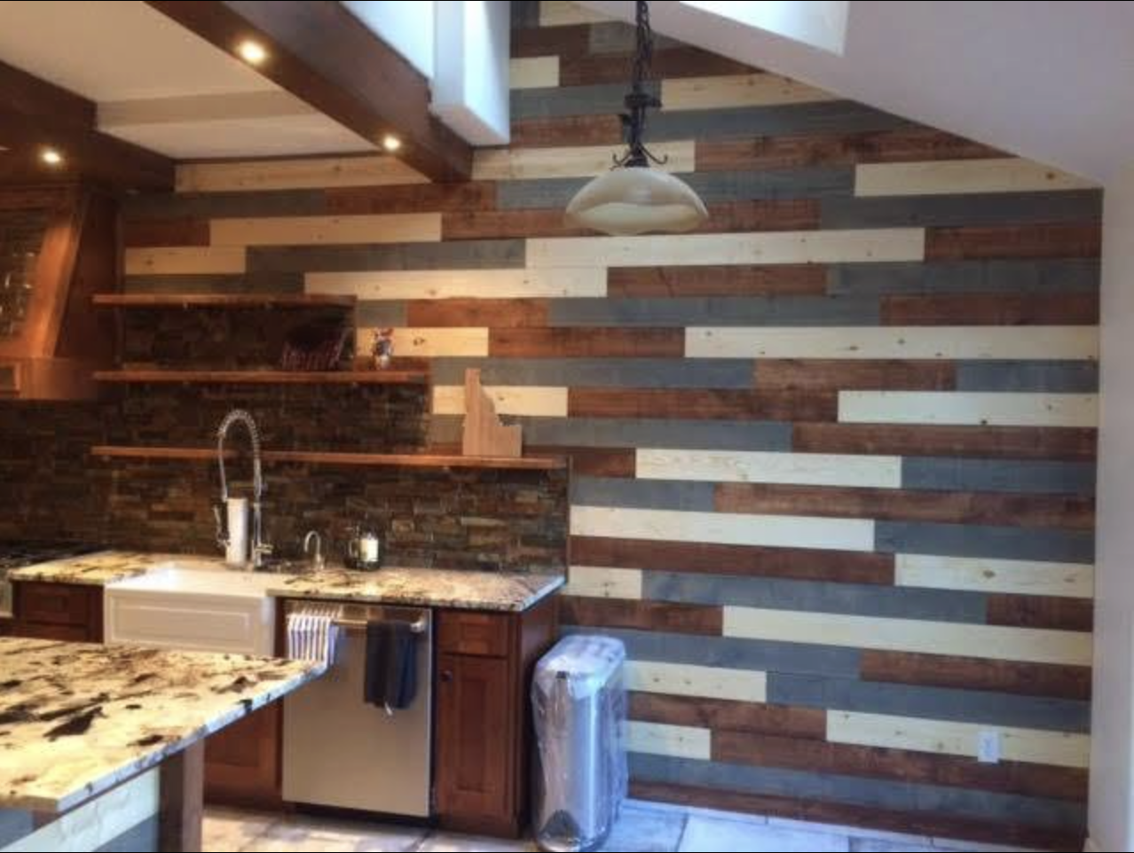 Reclaimed wood accent wall and open shelving